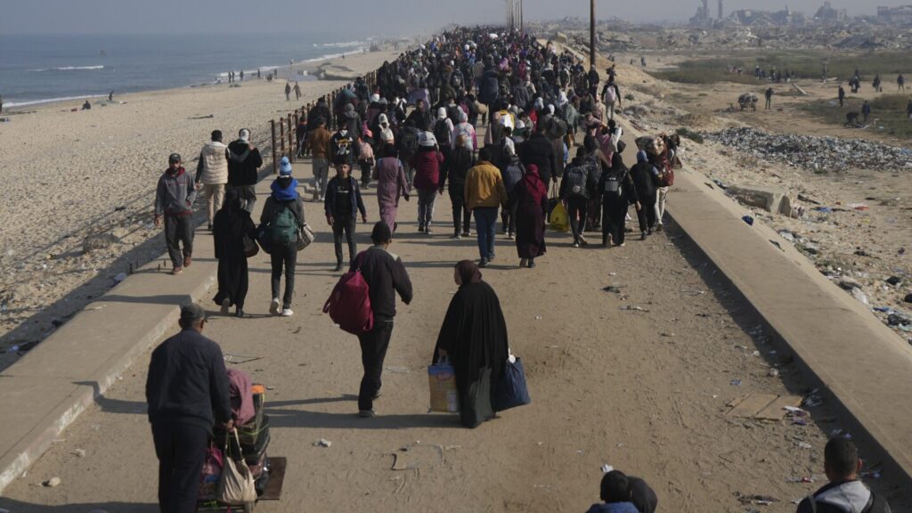 Middle East latest: Palestinians return to their homes in northern Gaza for a second day